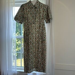 Size medium Tuckernuck dress. Worn once, then dry cleaned!